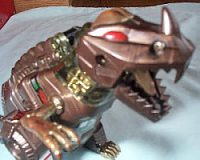 It seemed appropriate to dig out a photo of this Grimlock clone, since he looks that bit more ferocious than the original mould! Actually, if anyone has one of these they'd like to sell me... please drop me a mail!